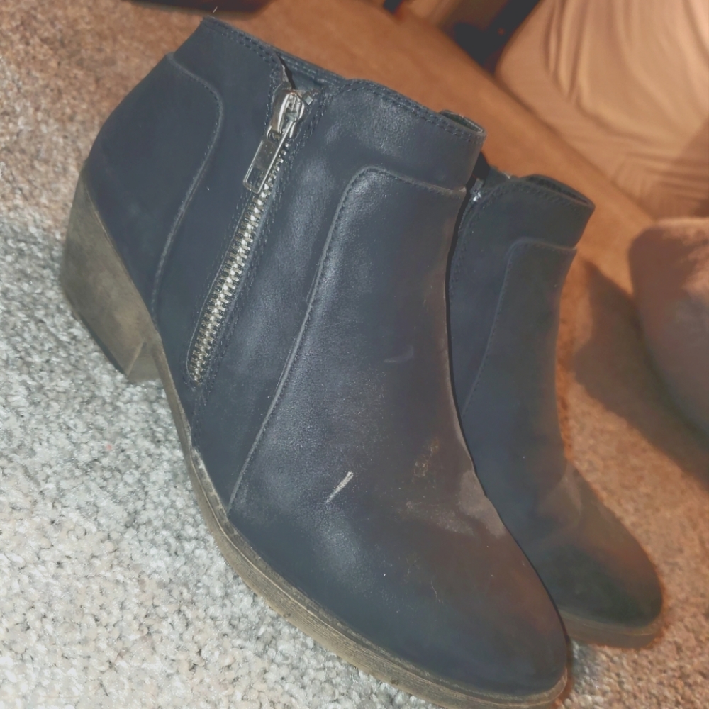 Warn destructed ankle boots